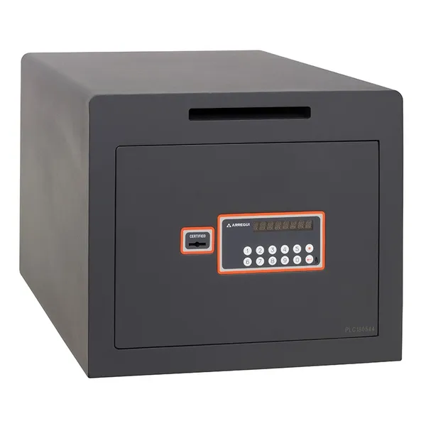 Detalle de caja de cobro con teclado electrónico y llave física